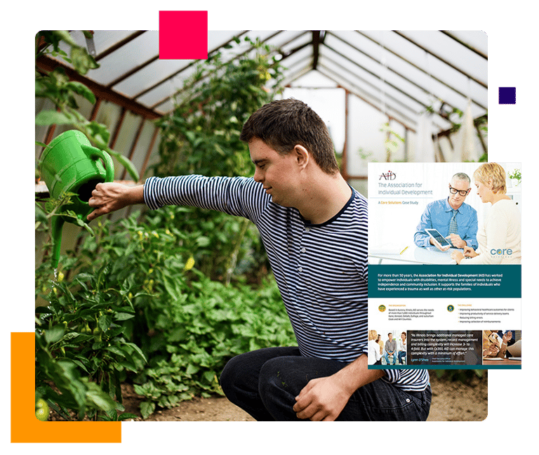 Man with down syndrome watering plants in a greenhouse